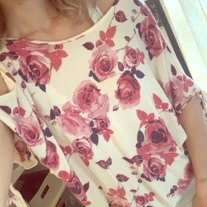 Super cute tie cut out shoulder blouse.